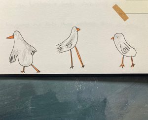 Sketchbook page of moving seaguls